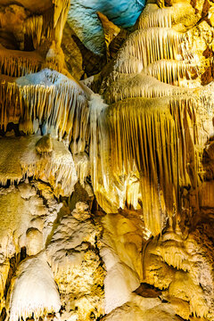 Crystal Cave formations glow blue and gold