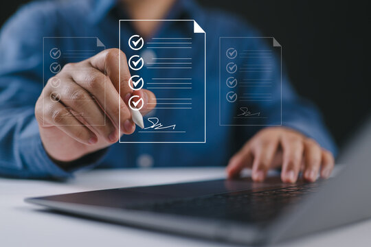 Electronic signature Businessman signs electronic document on digital document on page Electronic signature concept Writing business agreement Digital document management Paperless office