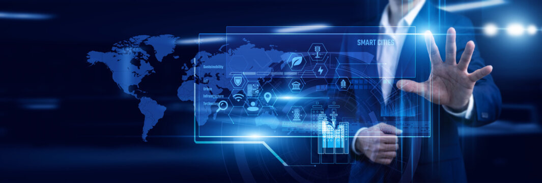 Urbanist touch digital virtual screen designing Smart Cities across the global map. Connected infrastructure improves living. Integrated tech systems optimize energy and daily traffic flows.