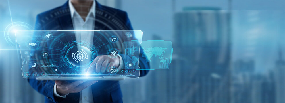 Businessman Using Tablet for Change Management and analyzing organizational transformation data. Improving business adaptability, managing operational transitions, supporting innovation