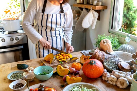 Cozy autumn kitchen cooking scene.