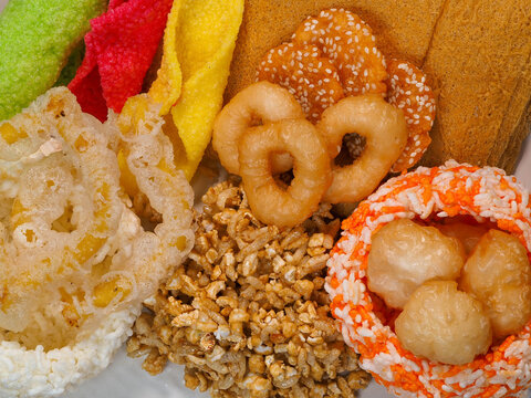 Traditional Southern Thai Buddhist merit-making festival sweets collection for Sart Duen Sip festival.Khanom La, Khanom Choh Hu, and Khanom Phong.
