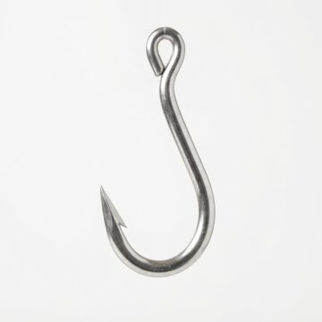 Close-up of stainless steel meat hook on metal surface