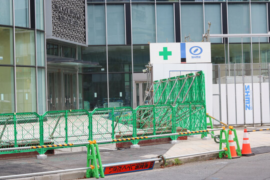 TOKYO, JAPAN - August 2, 2026: Fence in front of the under-construction Tokyo Midtown Nihonbashi.