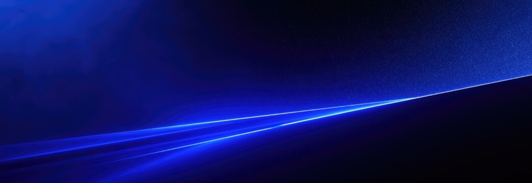 Abstract blue light streaks against a dark, textured background