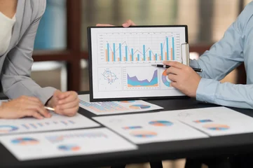 Finance and accounting team analyze data insight to financial reporting about financial management, investment strategy, risk management and finance and taxation planning, © utah51