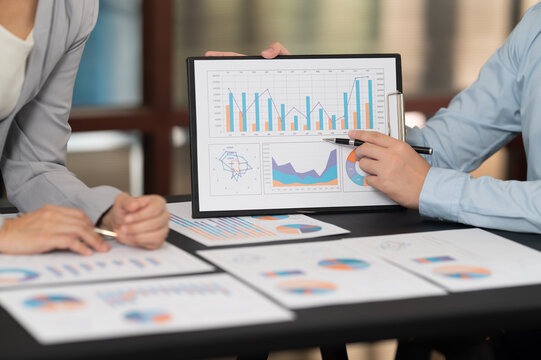 Finance and accounting team analyze data insight to financial reporting about financial management, investment strategy, risk management and finance and taxation planning,