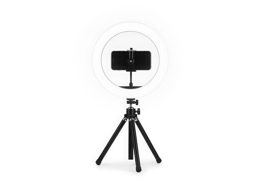 Smartphone on ring light tripod stand isolated on white background
