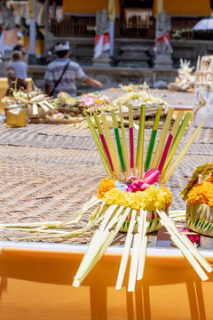 BALI, INDONESIA &ndash; OCTOBER 20, 2024: Traditional Balinese Hindu Canang Sari flower offerings made of woven palm leaves at Tirta Empul Temple.
