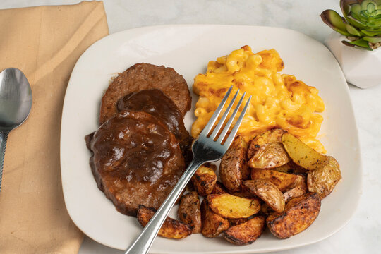 salisbury steak with  mac and cheese