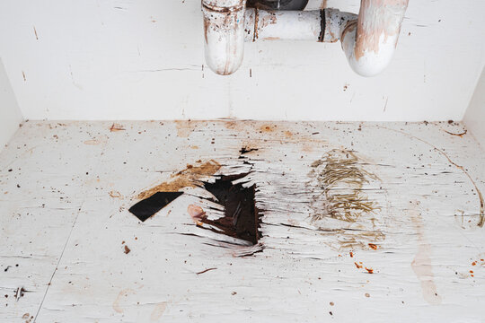 Home problems, Damaged water leak out from piping under sink in the kitchen