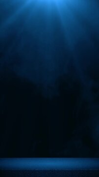 Blue Light Rays Through Fog on Dark Floor with Cinematic Spotlight Beam animation,blank stage music and product stream blank vertical social media motion background 