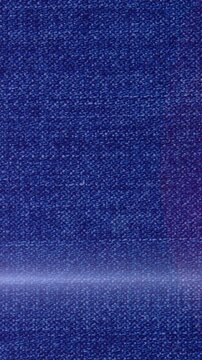 Animation of light spots over denim trousers
