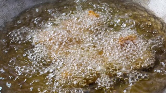 close up of frying method in the deep oil with hight temperature