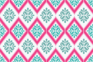 Seamless damask ikat pattern background. Elegant floral motif with geometric rhombus border in pink and teal. illustration for fashion textile, wallpaper, tile, or home decor. © Thanawat