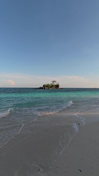 Small Tropical Island With Turquoise Waters