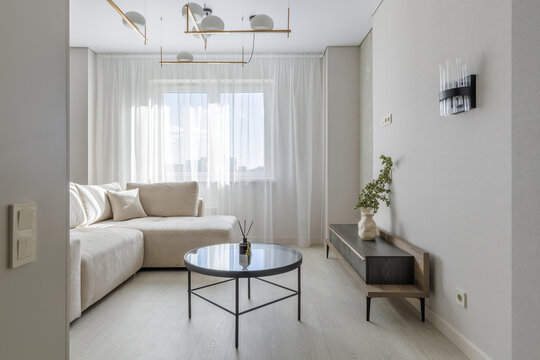 Modern Living Room Interior with Sectional Sofa and Coffee Table