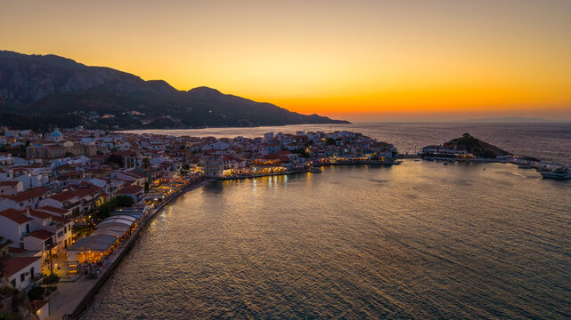 Aerial view of Kokkari village on Samos island, Greece at dusk. Kokkari is one of the main tourist hubs on the island.