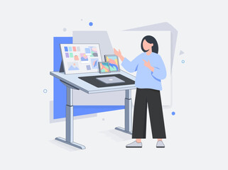 Fototapeta premium A woman presents her digital art project while standing at a modern desk with screens and mood boards