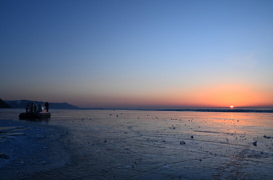 A hovercraft on Lake Baikal in the early winter morning. Olkhon Gate Strait