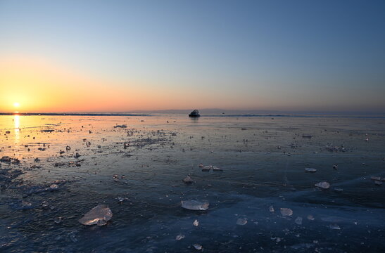 A hovercraft on Lake Baikal in the early winter morning. Olkhon Gate Strait