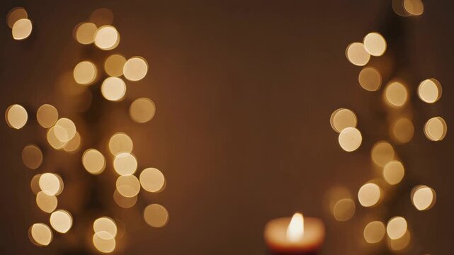 Romantic candle burning with bokeh lights creating a warm festive atmosphere for christmas, new year's eve, or a tranquil evening with a cinematic abstract background