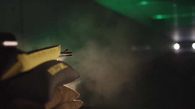 Rifle Firing With Muzzle Flash At Night Shooting Range
