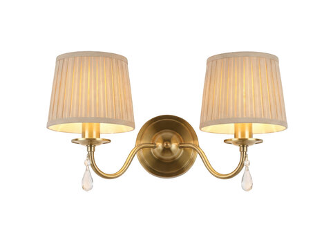 Vintage brass wall lamp with two fabric shades and crystal accents isolated on transparent background