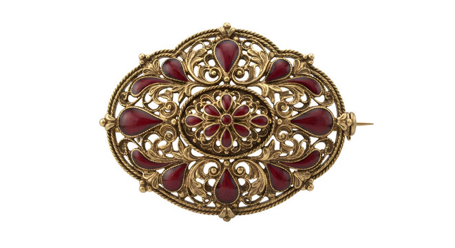 Ornate vintage gold brooch with red enamel teardrop stones on transparent background