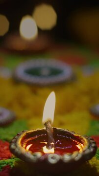 Clay diya lamps lit during diwali celebration, Diwali, or Deepavali, is India's biggest and most important holiday.
