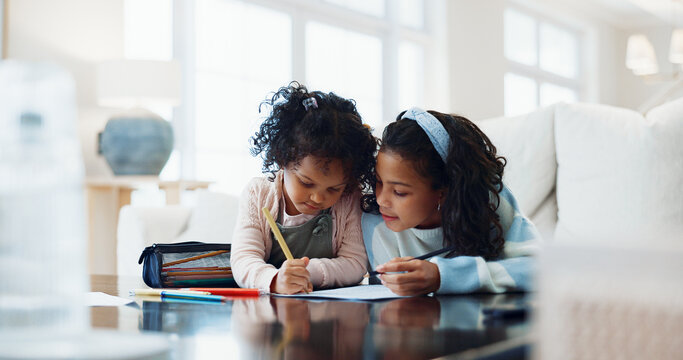 Children, siblings and learning with homework for education, studying or academic development in home. Girls, sister and helping elementary student with drawing, assignment or school project in house