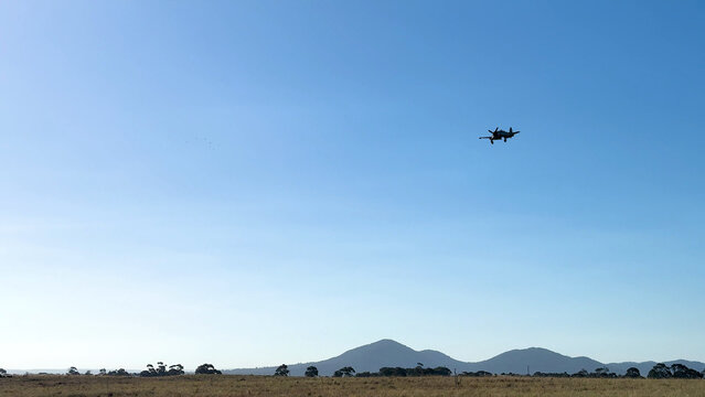 Vintage Hawker Sea Fury Aircraft Flying Over Geelong Landscape