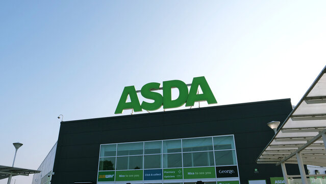 Leicester, England, UK - 17 July 2026: Asda supermarket store exterior front, green sign, Subway brand and UK retail building facade, editorial grocery shopping center entrance