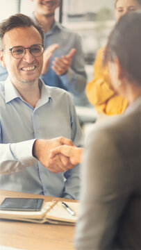 Business handshake in the office
