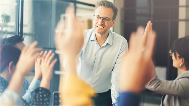 Discussing ideas and voting during a meeting