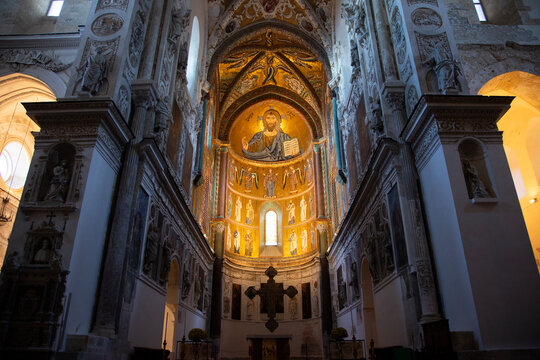 Cefalu, Italy; 1st January 2026: Interior of Cefalu Cathedral in Sicily, featuring the spectacular Christ Pantocrator mosaic in the apse.