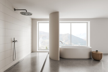 Fototapeta premium Contemporary minimalist bathroom interior with freestanding bathtub, walk-in shower, mountain view, and refined neutral architectural design. 3D Rendering