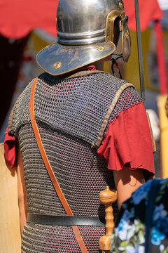 Historical reenactor with roman helmet and sword The Concept of past civilizations
