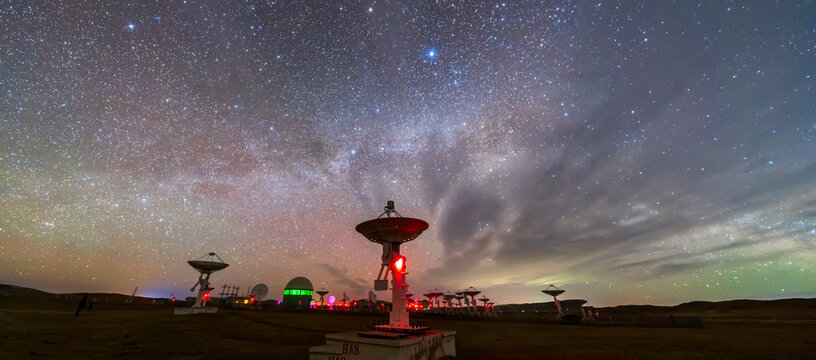 radio telescope on the background of stellar tracks, The observatory's radio telescope