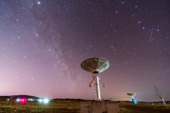 radio telescope on the background of stellar tracks, The observatory's radio telescope