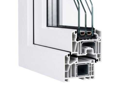 Architectural cross-section cut of a modern multi-chamber PVC window profile with triple glazing glass, isolated on transparent background.	