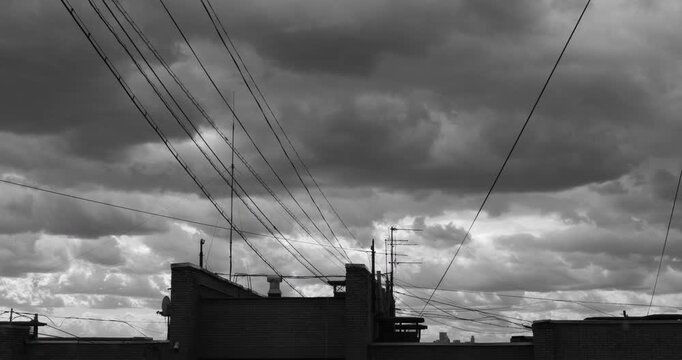 Cinematic time-lapse of textured gray clouds covering the sky. Atmospheric overcast cloudscape with natural movement, ideal for weather, climate change, storm, nature, environmental, and background 