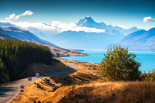 Scenic Road Trip Winding Road Along Lake Pukaki Under Mount Cook During Autumn in New Zealand