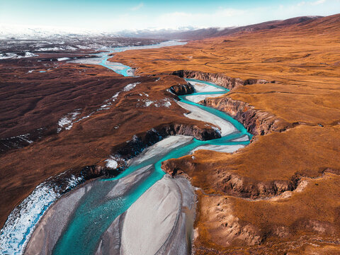 Sary Jaz valley with autumn wilderness, rugged gorge and winding river in Kyrgyzstan
