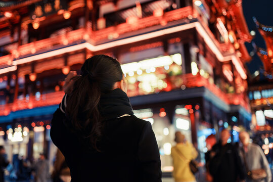 Happy Asian Woman Walking in Yuyuan Garden Old Street During Night City