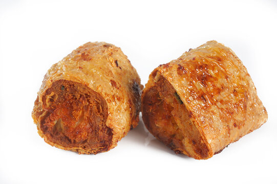 deep fried crab meat rolls or hoi jo on white background