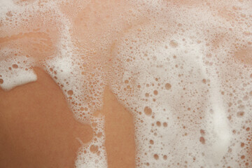 Fototapeta premium Close Up of Bath Foam on Skin During Bathing 
