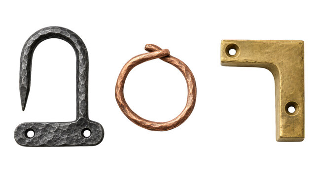Collection of handcrafted metal hardware on a transparent background