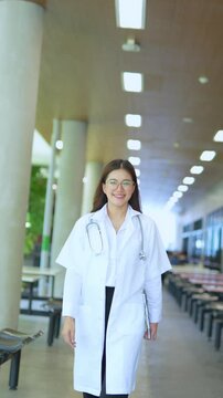  Healthcare Female doctor with tablet for telemedicine, research or online consultation in hospital.