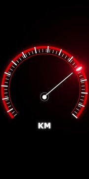 Glowing red speedometer gauge with white needle indicating velocity on a dark background showing the text km for measuring vehicle speed